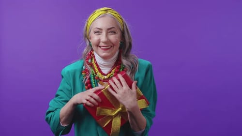 A Stylish Woman Displaying Colorful Accessories Elegantly Set Against a Purple Background