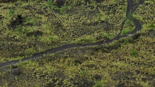 Black Lava Motorcycles Riding Black Sand Drone View