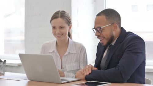Colleagues Working Together on a Video Call