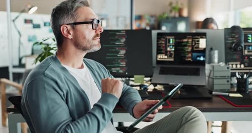 Man, glasses and thinking with tablet for web development, research and problem solving in office