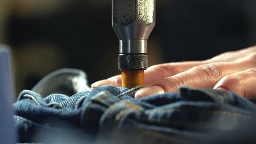 Close-Up of Denim Fabric in Manufacturing Equipment