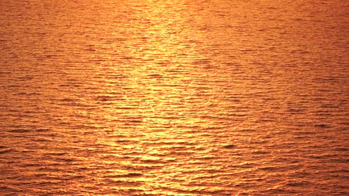 Sea Water Surface Aerial View on Golden Sea Water at Sunset Sun Glare Abstract Nautical Summer Ocean