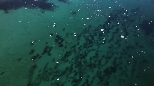 Aerial View Clear Sea with Ice Floes on the Surface