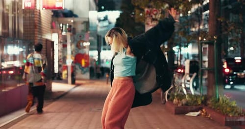 City, night and woman with mobile for dancing, audio track and happy with music for kpop playlist