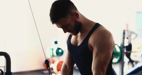 A Man Doing Tricep on a Block Exercise