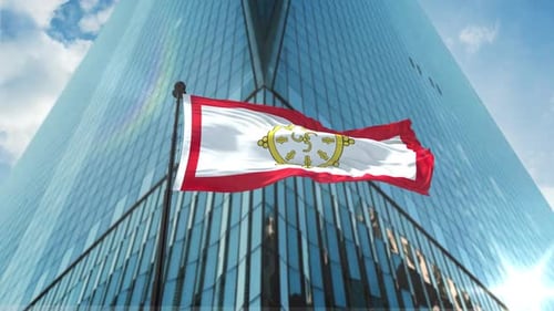 Realistic Flag Waving in Front of Modern Corporate Building