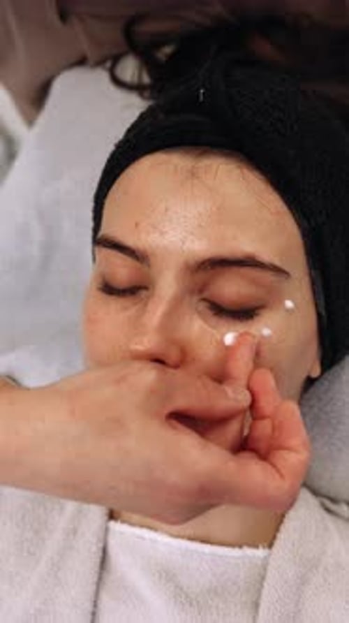 Relaxing Facial Treatment at a Spa Featuring Soothing Skincare Application