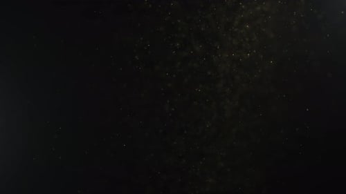 Abstract Shimmering Golden Particles Background