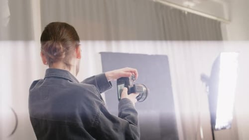 Male Photographer Working in Studio