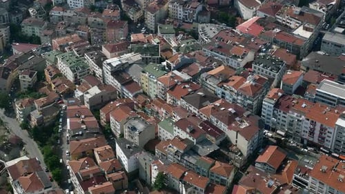 Aerial View Showing a City Area with Many Buildings and Red Rooftops in a Residential Neighborhood