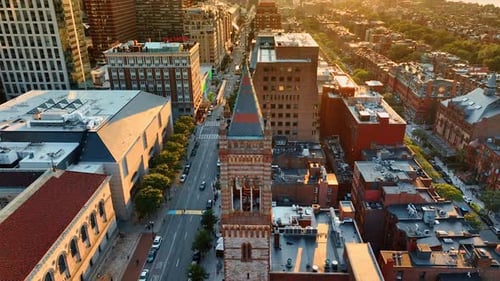 Golden hour in Boston, Massachusetts, USA. Drone flying above the tower of Old South Church.