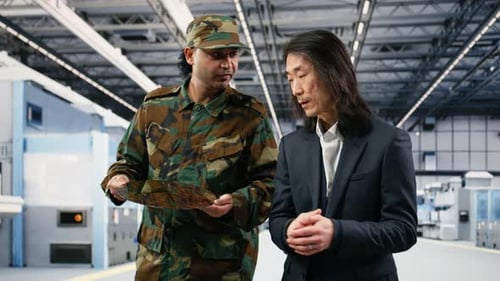 Microelectronics Factory Manager and Soldier Increase Production of Microchips