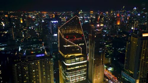 City Lights from Above: A Captivating Aerial Night View of Urban Skyscrapers 4K