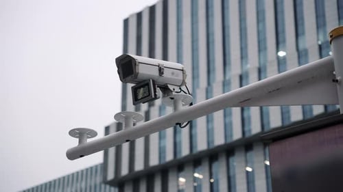 Close Up CCTV Camera with LED Backlighting From Below for Monitoring City Residents and Maintaining