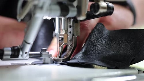 Close Up Sewing Machine Stitching Dark Fabric