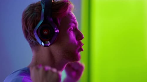 Excited Man With Headset Yelling in Studio