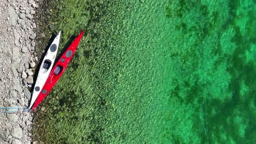 Aerial View of Kayaks Docked on a Lake Shore