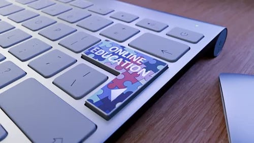 Pressing Online Education Button on a Modern Keyboard