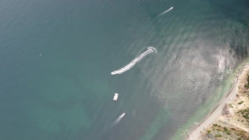 Boats Sailing on the Ocean Waters Near Coast