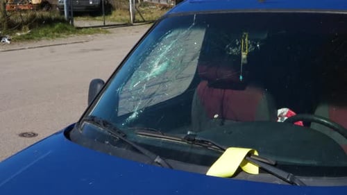 Car with Smashed Windshield and Traffic ticket, Medium Handheld