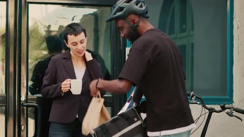 Restaurant Carrier Giving Fastfood Order to Client