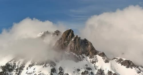 Snowy Mountain Peaks With Clouds. British Columbia, Canada.
