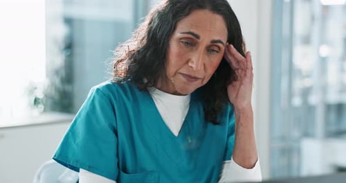 Frustrated woman, doctor and stress with headache in pressure, anxiety or overworked at hospital