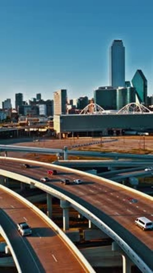 Exploring downtown Dallas with aerial view showcasing highways and skyline