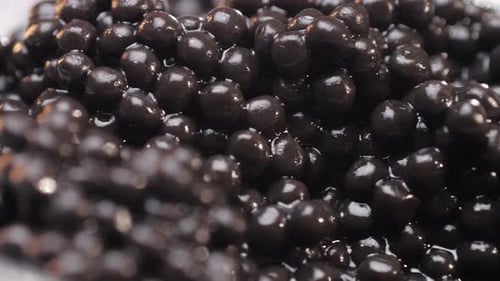 Macro Shot of Shiny Black Caviar Pile