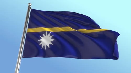 Nauru National Flag Waving in Wind Against Blue Sky