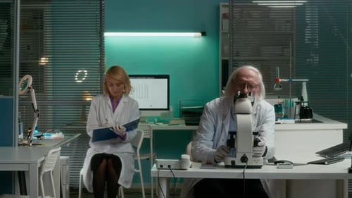 Scientists Working in Modern Laboratory Setting