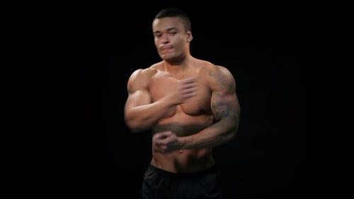 Muscular Man Stretching Before Workout