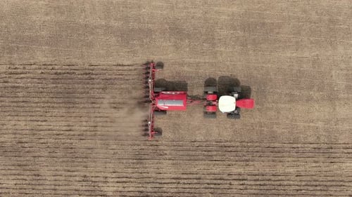 Tractor Cultivating the Rural Farmland From Above