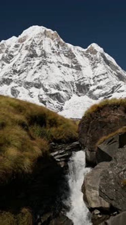 Vertical Small Waterfall Stream Landscape in Himalayas Mountains in Nepal, Vertical Video for Social