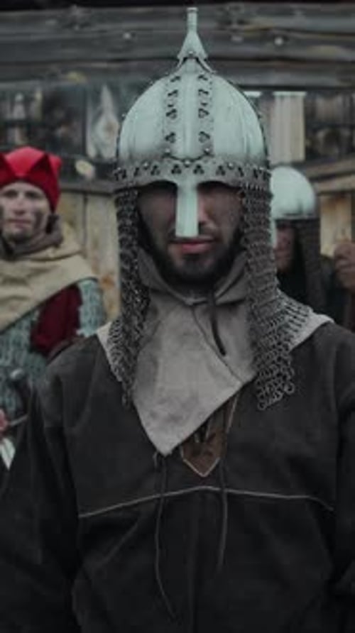 Portrait of Medieval Military Commander with Sword and Shield Guarding Fort