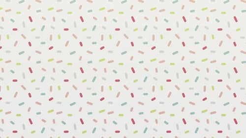 Yum Collection: A white background with animated multi color candies from left to right