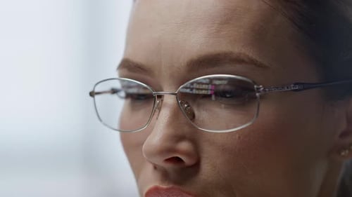 Woman Wearing Glasses Looking at Computer Screen