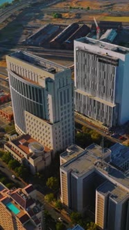 Contemporary architecture of Sacramento downtown. Sunny scenery of the city with lively traffic