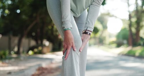 Senior person, hands and knee injury with pain on road for workout accident or emergency