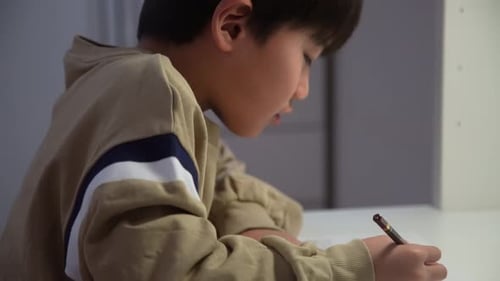 A boy practicing calligraphy
