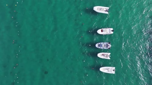Vacation and leisure. Aerial view on fast boat on blue Mediterranean sea at sunny day.