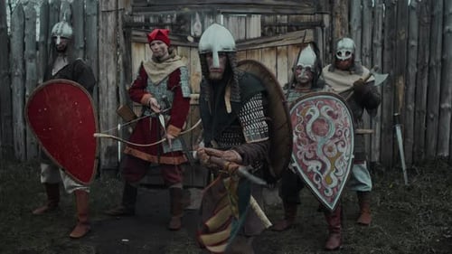 Viking Warriors Armed and Ready at Wooden Gate