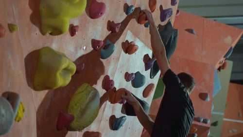Man Indoor Rock Climbing for Fitness and Sport