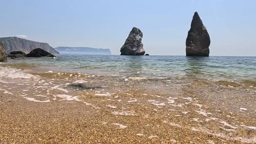 Small Sea Wave Blurred Soft Foamy Waves Washing Golden Sandy Beach and Volcanic Rocky Shores Nobody