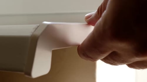05. The plug is attached to the end of the window sill with glue. Construction works. Installing a w