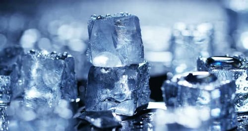 Refreshing Ice Cubes with Water Droplets in Close Up