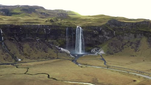 Seljalandsfoss Waterfall In Landscape In Iceland