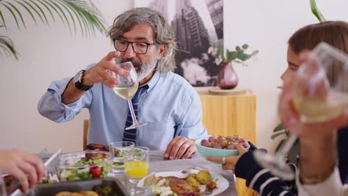 Family Meal Around the Dining Table Together