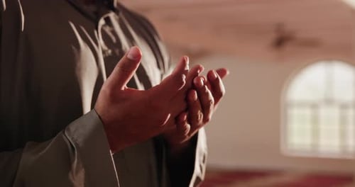 Muslim, hands and man in mosque for prayer, devotion and faith in religion in Ramadan