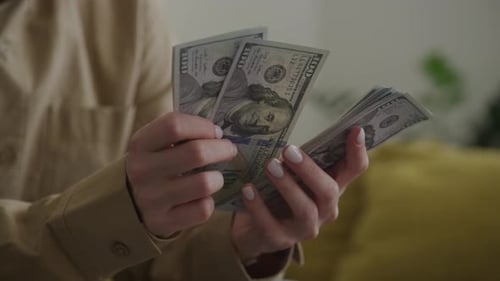 Counting Dollar Close Up Orbiting Around